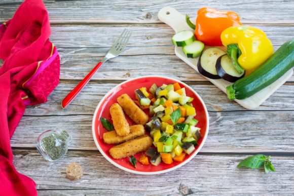 Breaded mozzarella bites with Mediterranean vegetables