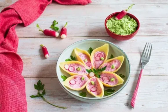 Conchiglioni with beetroot-radish filling and radish butter