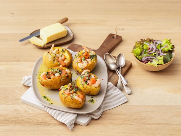 Seafood-stuffed baked potatoes